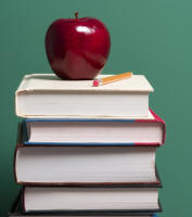Stack of Books with Apple and Pencil on Top